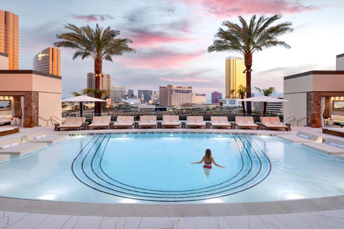 an outdoor pool overlooking las vegas at hotel Crockfords